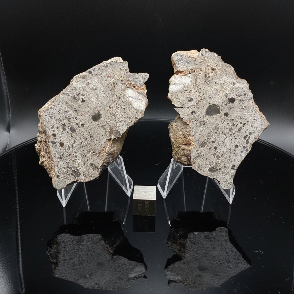 NEA 089 lunar meteorite matched pair, both mirror polished cut faces side by side with scale cube, 107.30 g total