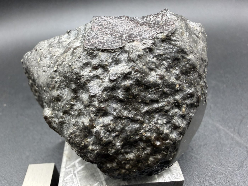 Fusion crust across the exterior of the 187.65g Sinawan 005 R5-6 chondrite