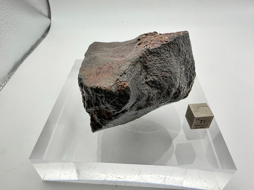 NWA XXX chondrite 316.40g -- trailing edge fusion crust showing thermal gradient from oriented atmospheric entry