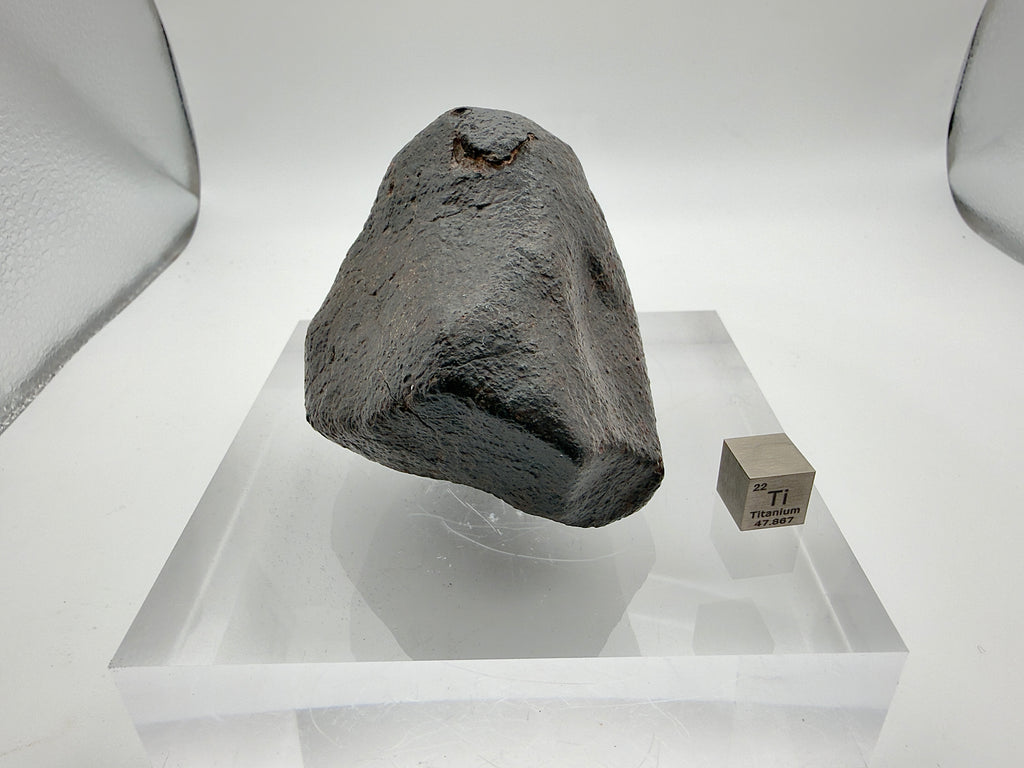 NWA XXX chondrite 313.16g -- fresh black fusion crust showing orientation flow patterns and surface regmaglypts