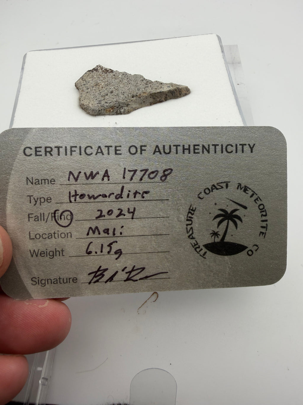 NWA 17708 howardite 6.15g -- black fusion crust covering approximately 50% of edge surfaces from atmospheric entry