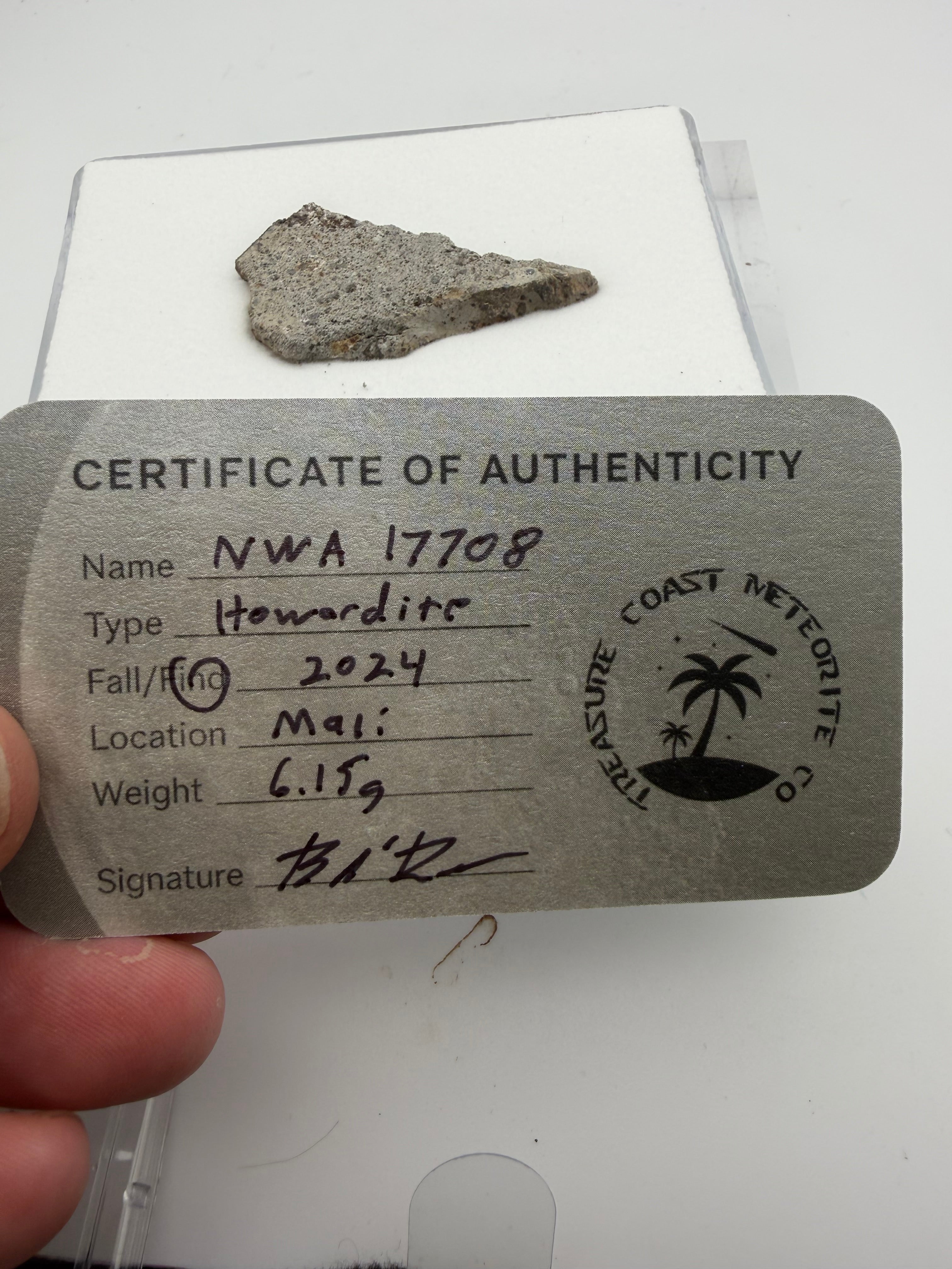 NWA 17708 howardite 6.15g -- black fusion crust covering approximately 50% of edge surfaces from atmospheric entry