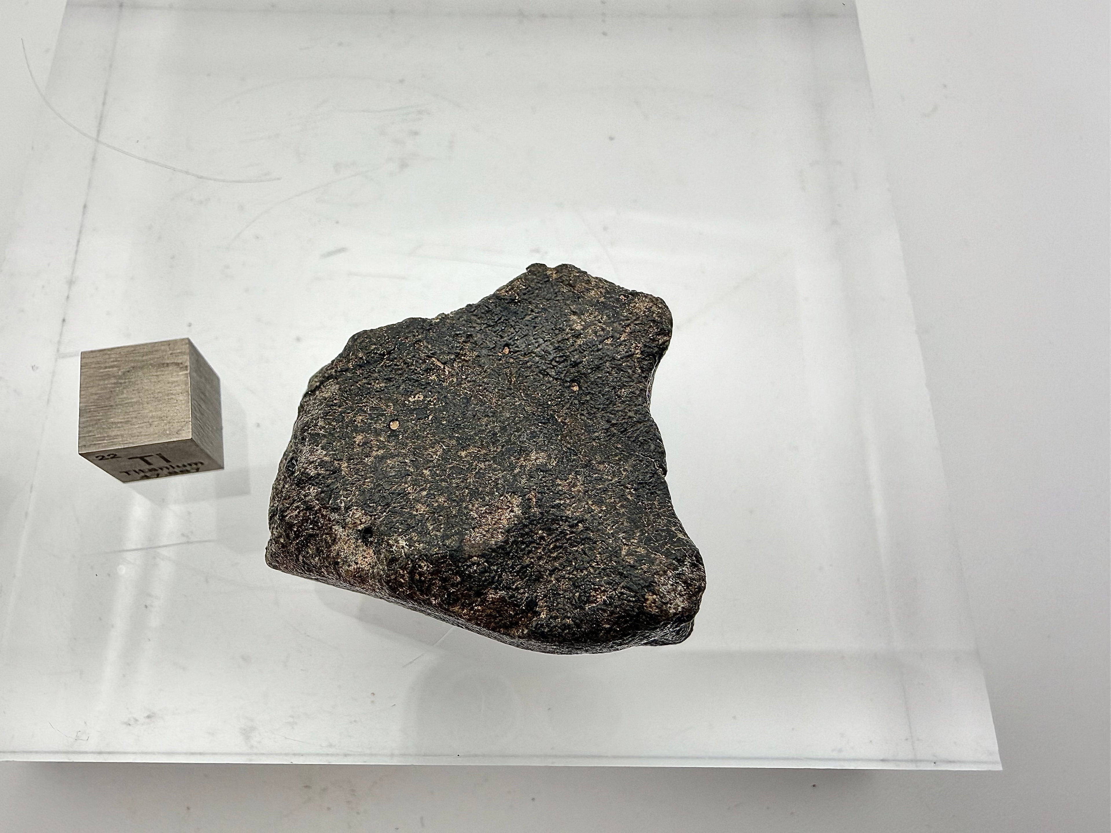 Guemar 002 lunar meteorite 45.92g -- fusion crust preservation detail without terrestrial weathering or oxidation