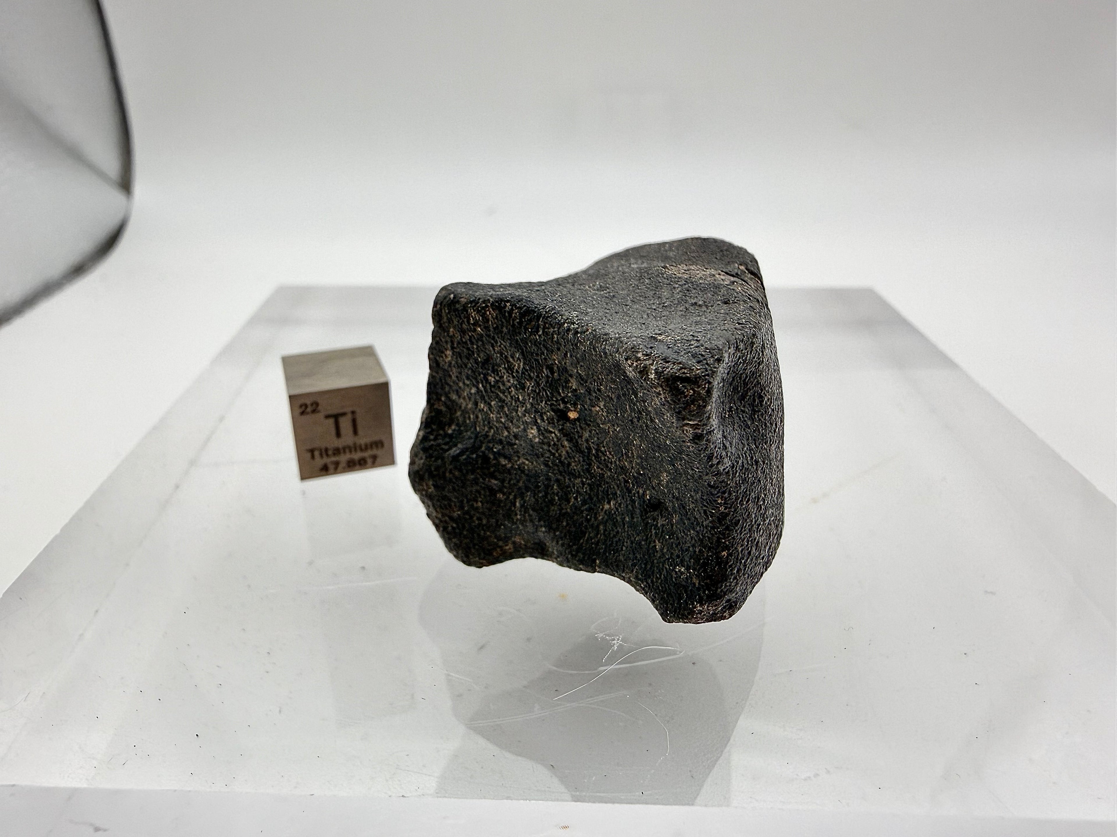 Guemar 002 lunar basalt individual 45.92g -- complete specimen showing three-dimensional form preserved from fall