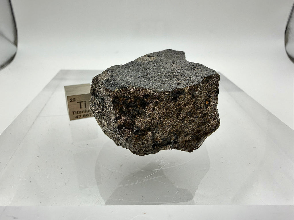 Guemar 002 mare basalt 45.92g -- pyroxene and plagioclase crystal boundaries visible through natural surface break