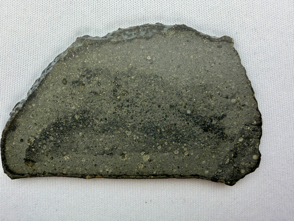 Sinawan 005 Rumuruti meteorite 24.45g -- light and dark lithology boundary with chondrule structure visible in both zones