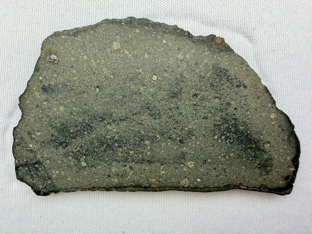 Sinawan 005 R-chondrite 24.45g -- fusion crust remnants and dual thermal zones showing metamorphic grade contrast