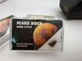 NWA 17472 fragment 0.10g in display case -- authenticated Mars material with certificate and specimen ID card