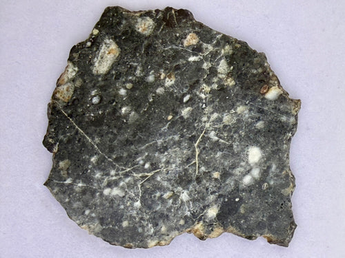 Bechar 003 lunar meteorite 4.80g -- angular clasts and impact melt matrix from Moon's highland crust