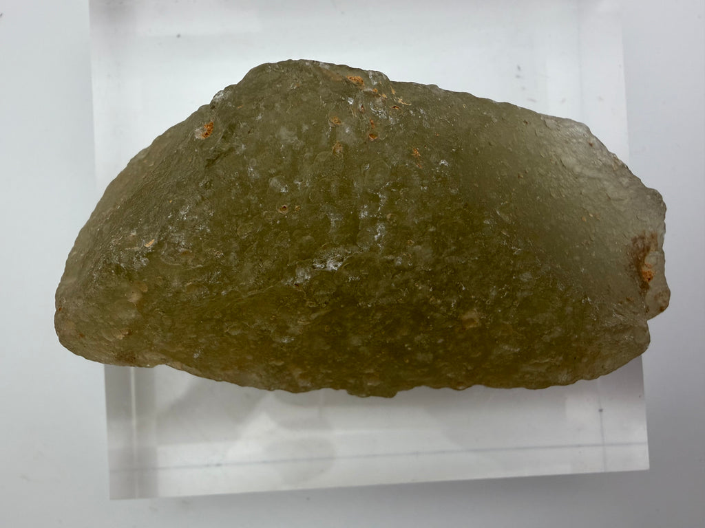 Libyan Desert Glass 178.68g -- surface detail showing natural weathering patterns and sculptural contours from Saharan enviro