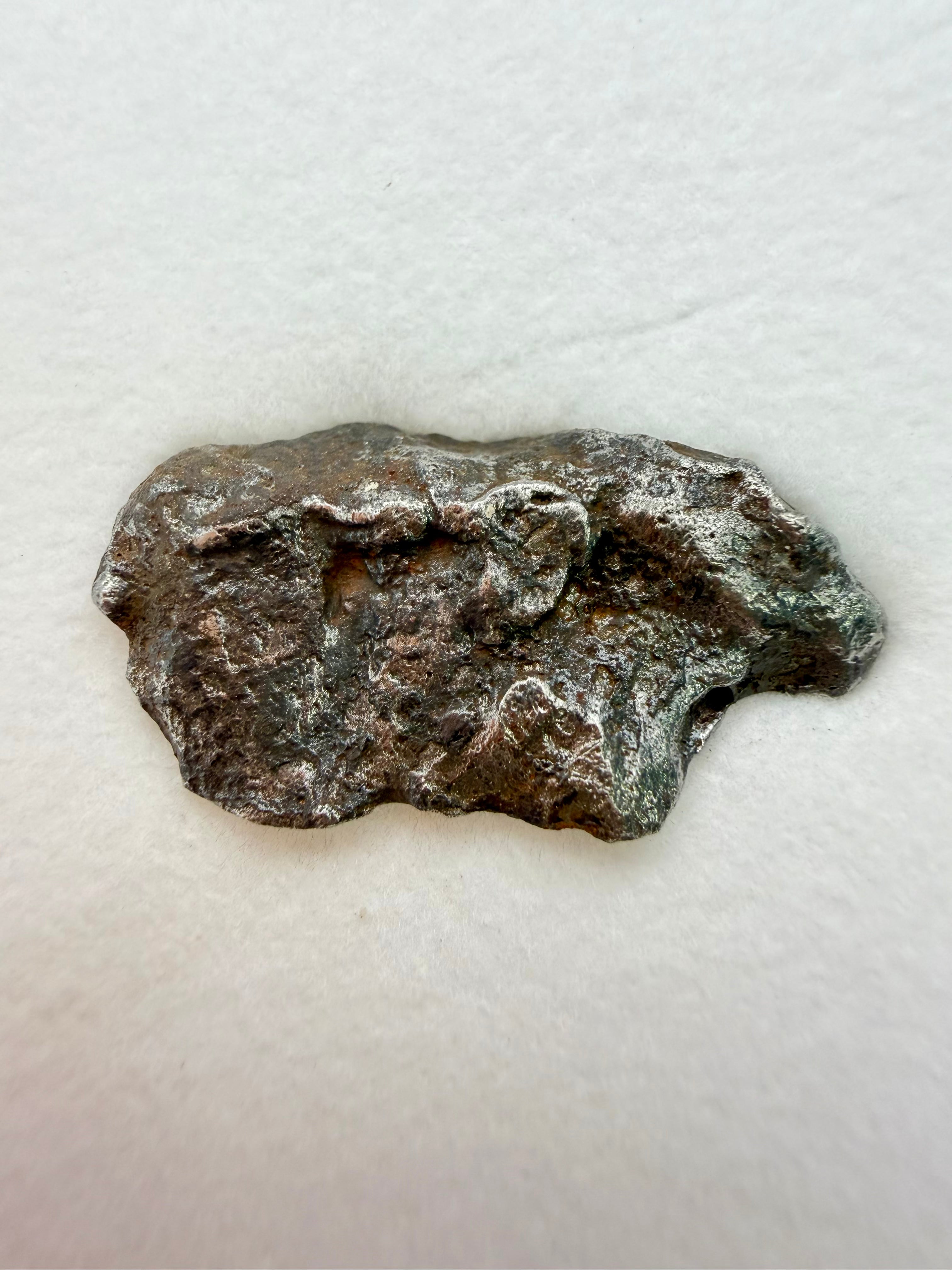Gebel Kamil iron meteorite 1.00g -- metallic iron surface with minimal desert weathering from 2009 crater recovery