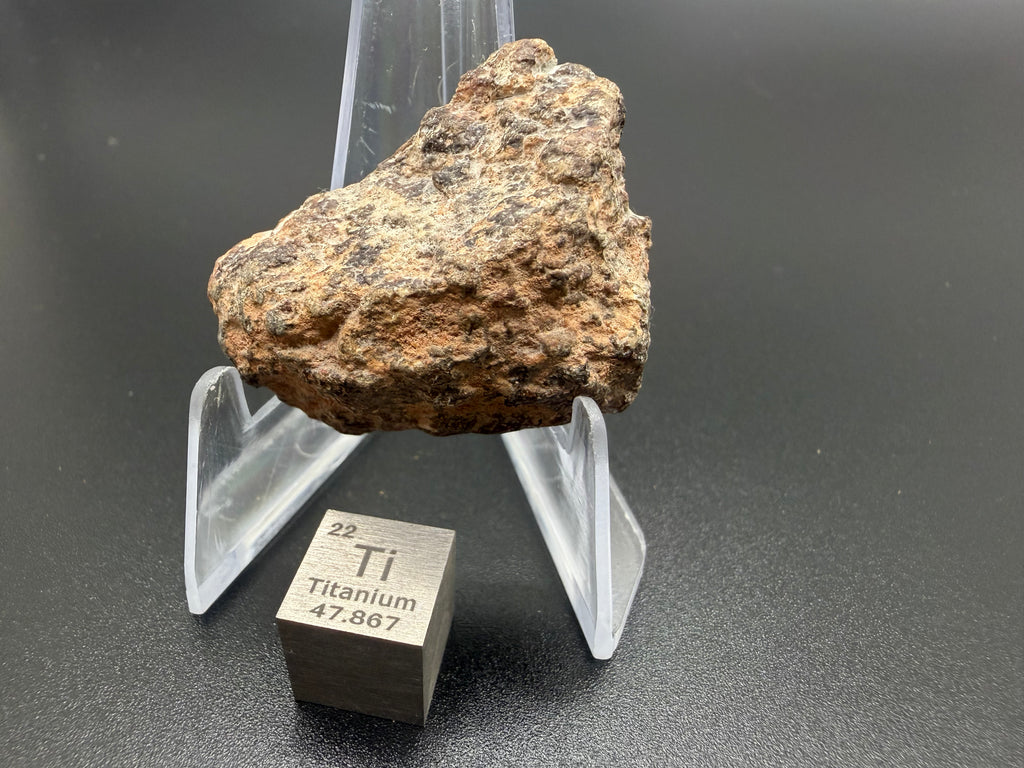 NWA 17918 diogenite meteorite 13.33g -- polished face and natural exterior edge showing crustal clast boundaries