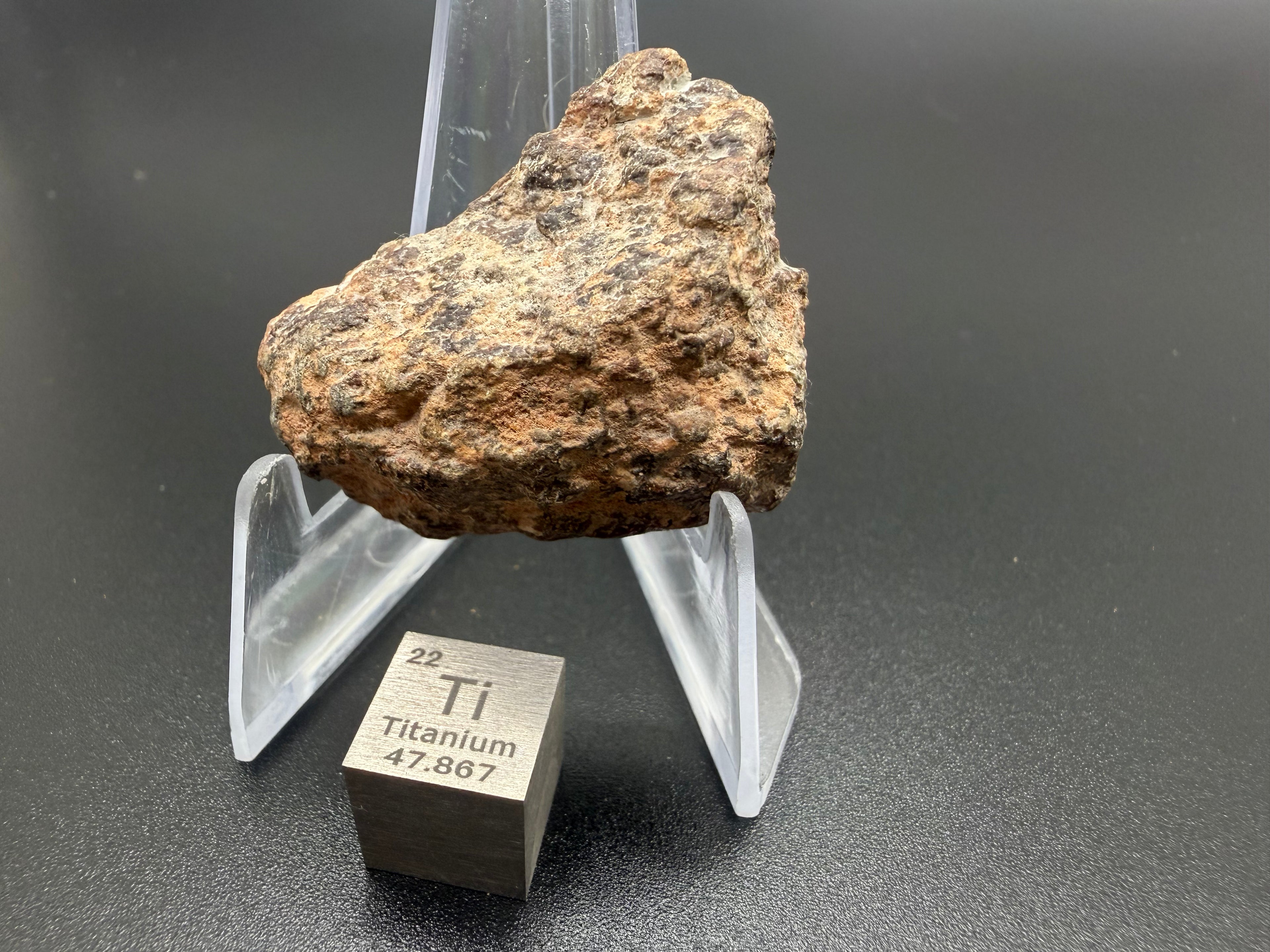 NWA 17918 diogenite meteorite 13.33g -- polished face and natural exterior edge showing crustal clast boundaries