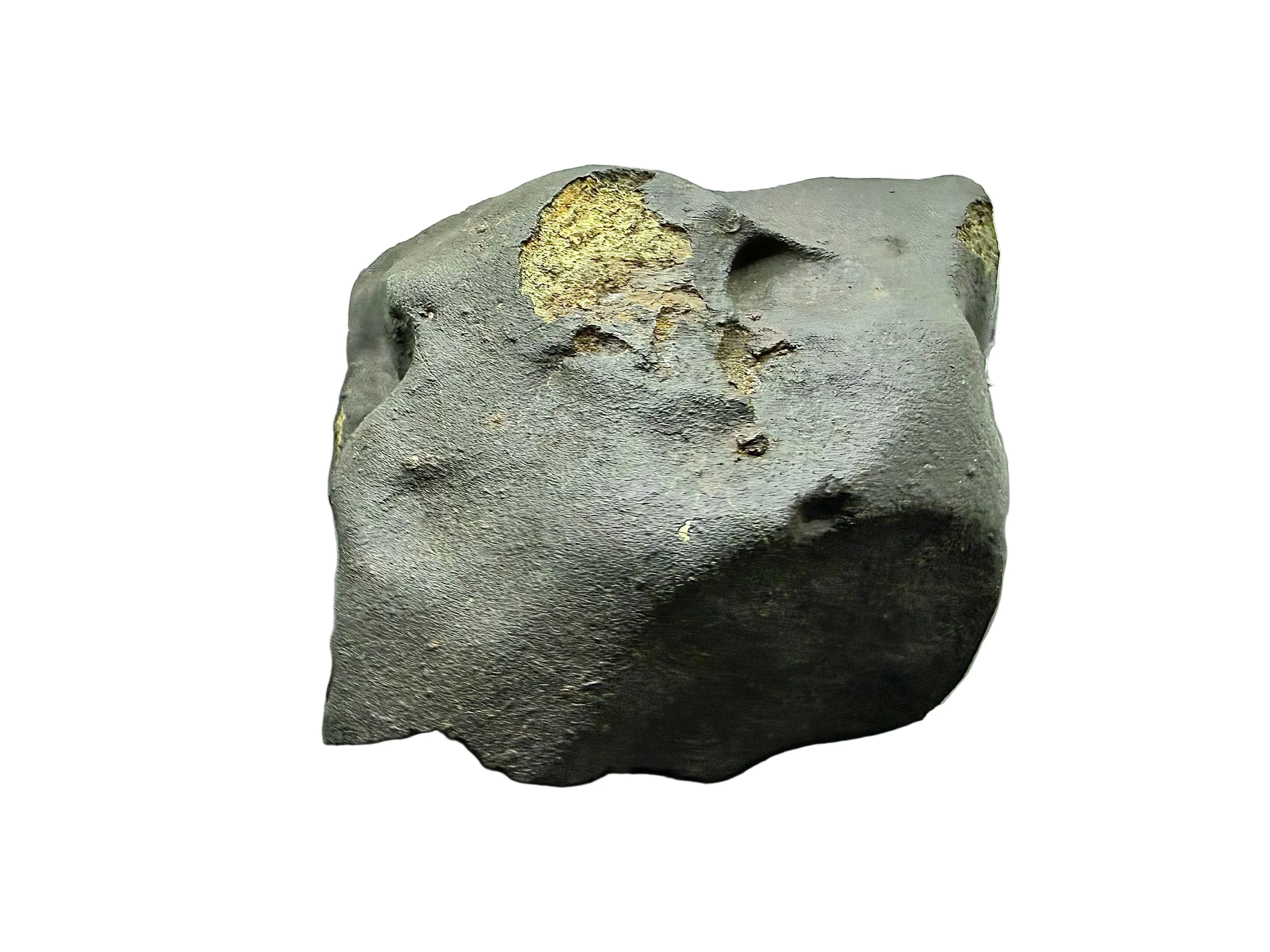 NWA XXX ordinary chondrite 1668.24g -- leading surface showing pronounced regmaglypts and black fusion crust