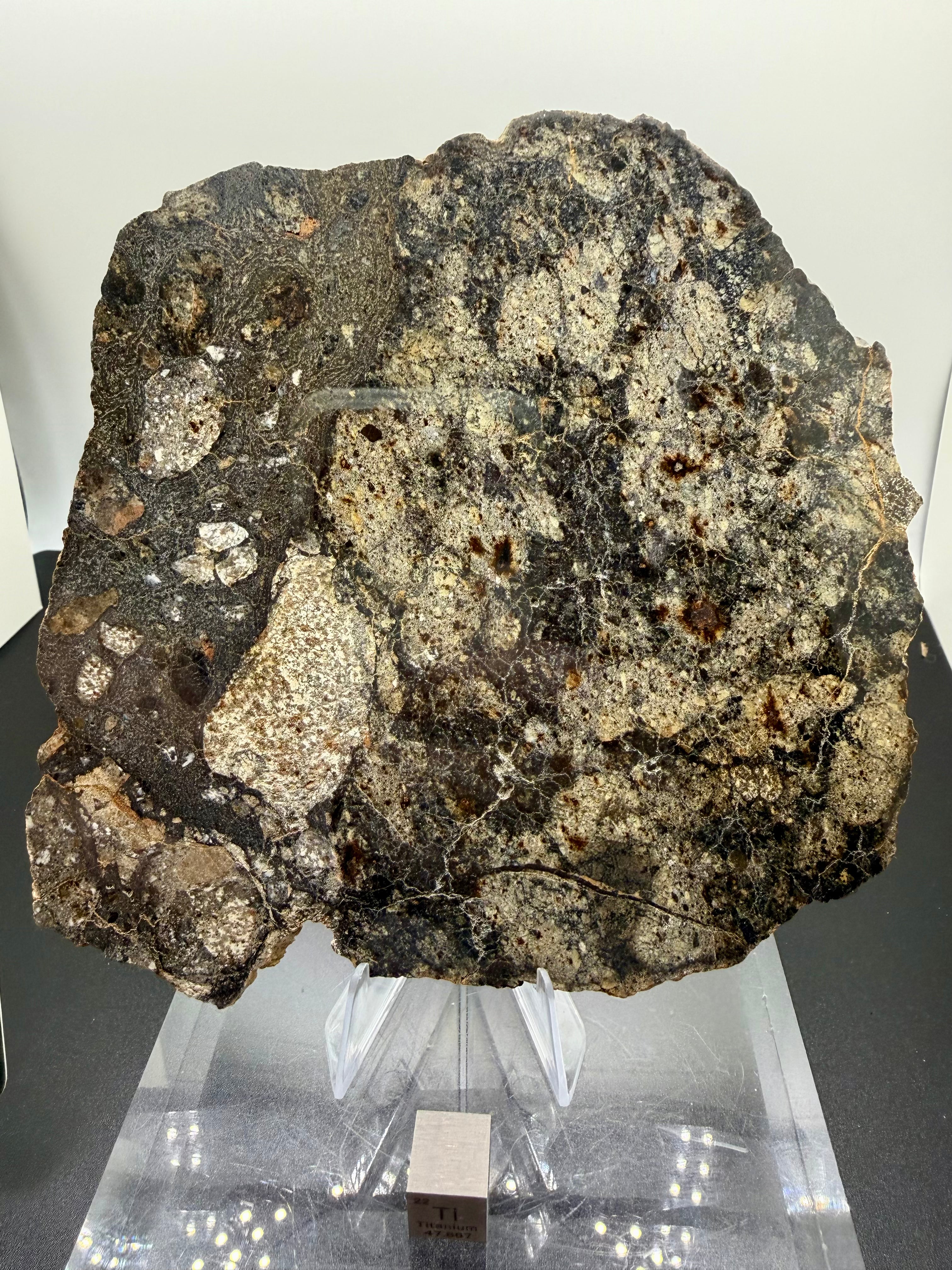 NWA 18048 eucrite-pmict 133.72g -- angular to subrounded basaltic clasts embedded in fine-grained groundmass