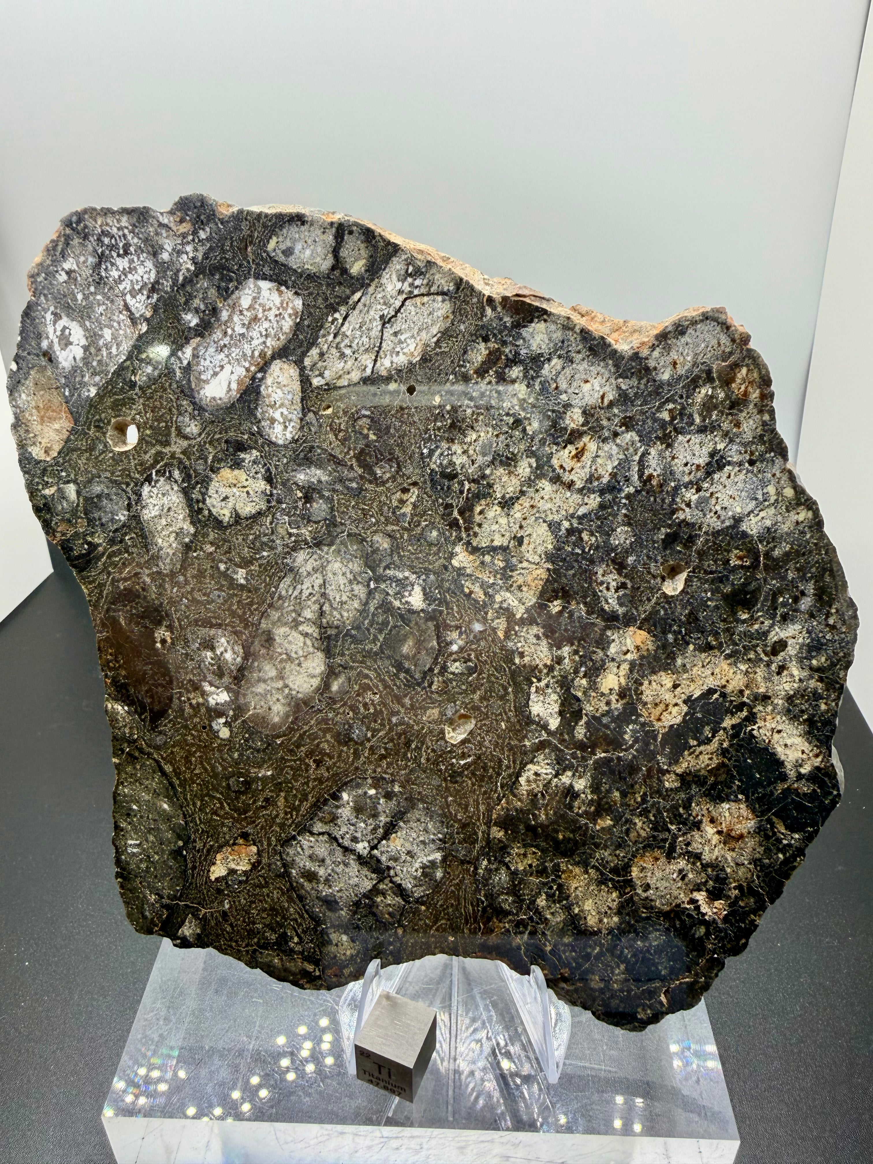 NWA 18048 eucrite-pmict 119.29g -- clast boundary detail showing sharp contacts between different basaltic lithologies