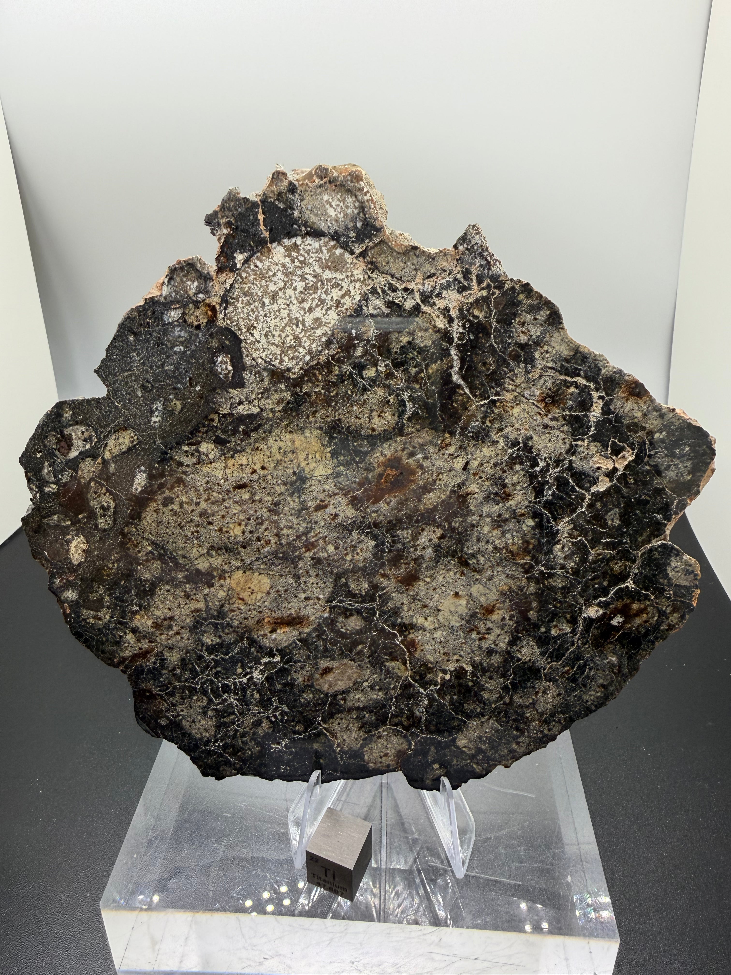 NWA 18048 eucrite meteorite 128.81g -- thick impact melt veins cutting through polymict clast assemblage
