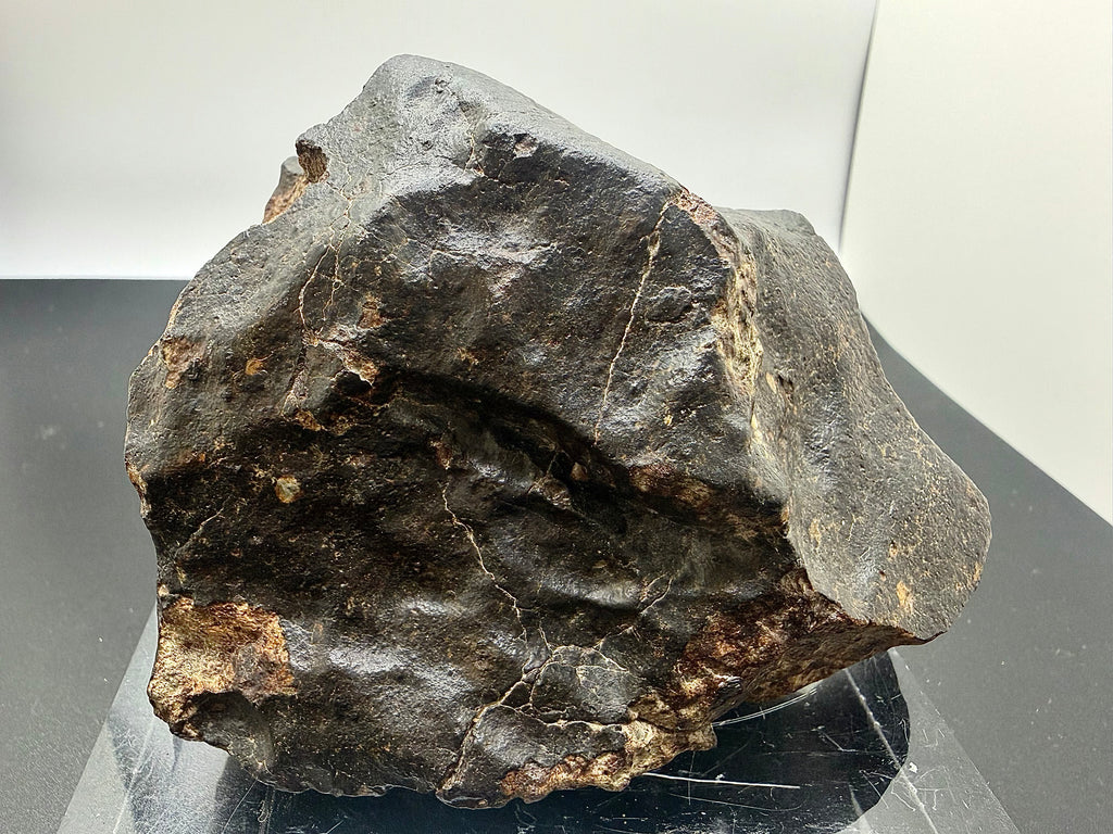 NWA XXX chondrite 869.00g -- pronounced regmaglypts and thumbprint depressions from atmospheric ablation