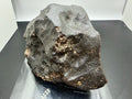 NWA XXX unclassified ordinary chondrite individual 869.00g, oriented with regmaglypts -- complete stone with fusion crust, Tr