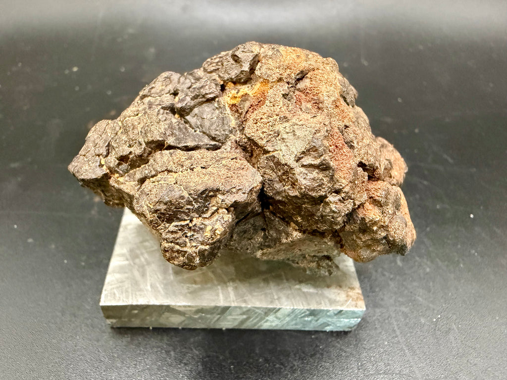 Three-quarter view of NWA 18592 Mesosiderite Meteorite showing complete individual shape and contrasting silicate and iron-nickel zones, 161g