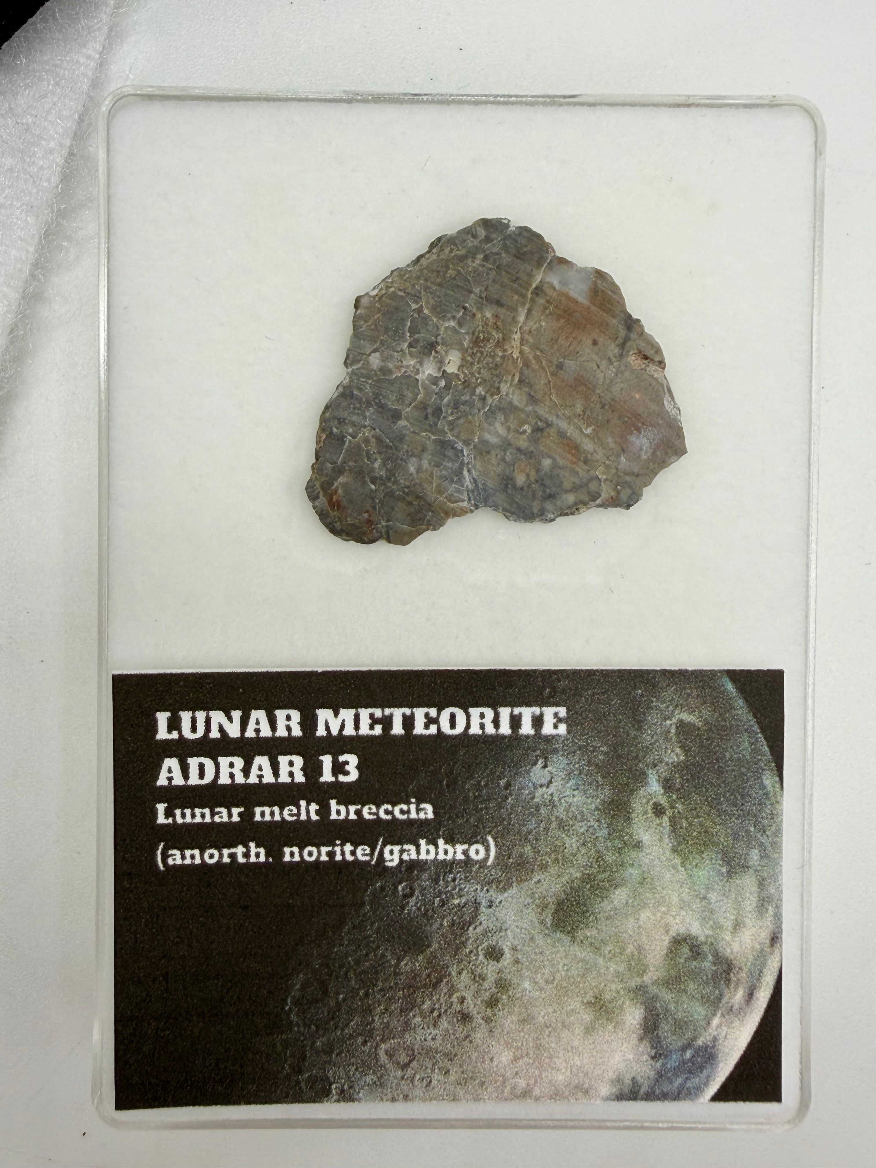 Adrar 013 lunar meteorite full slice, 2.77g, with display card showing classification