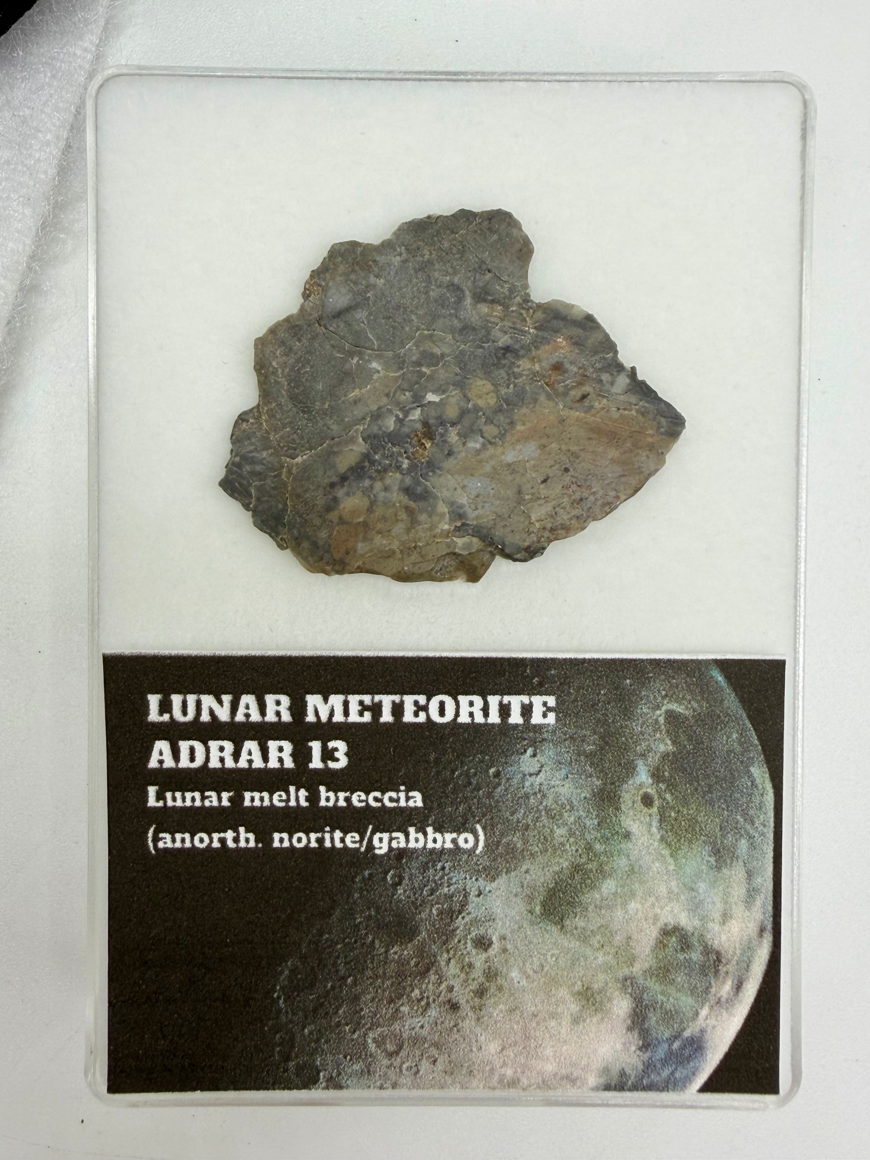 Adrar 013 lunar meteorite full slice, 2.81g, with display card showing classification