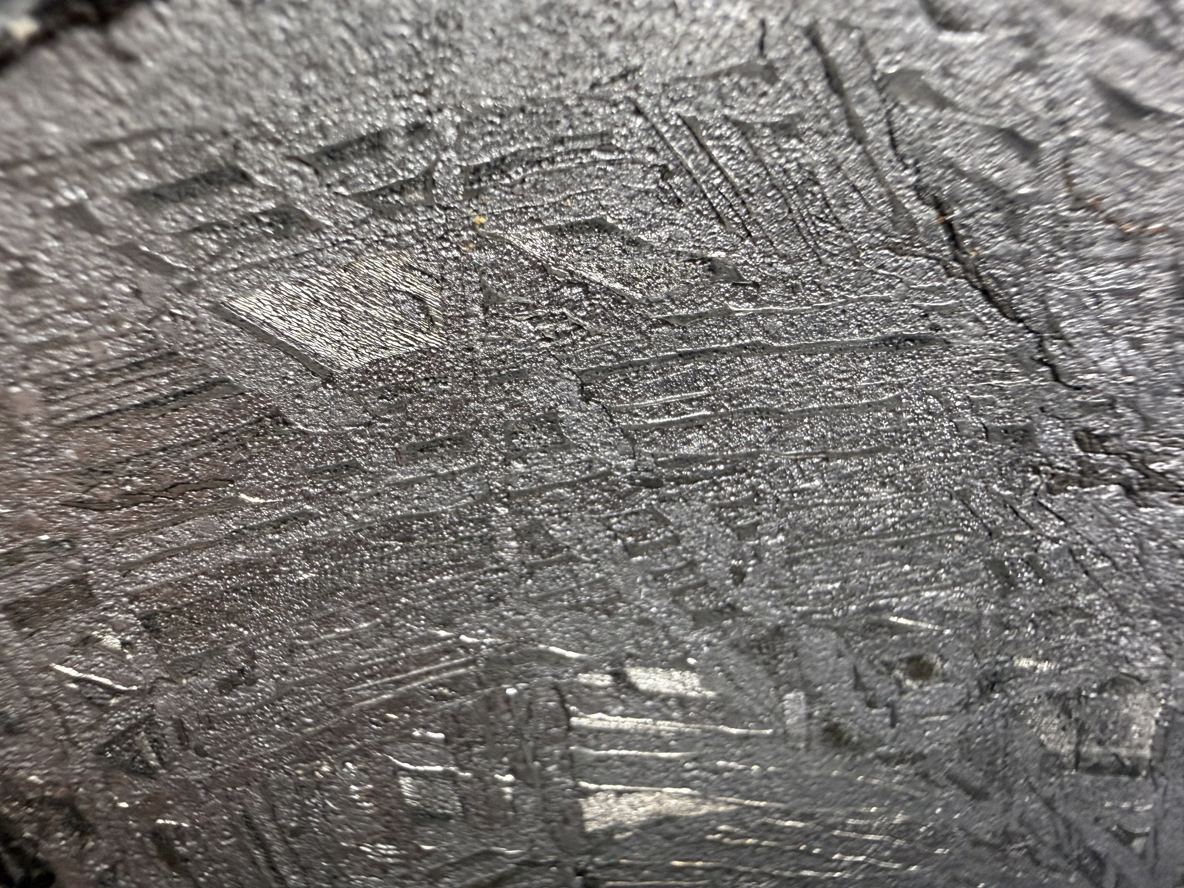 Close-up of the etched metal surface on the Aletai iron meteorite slice