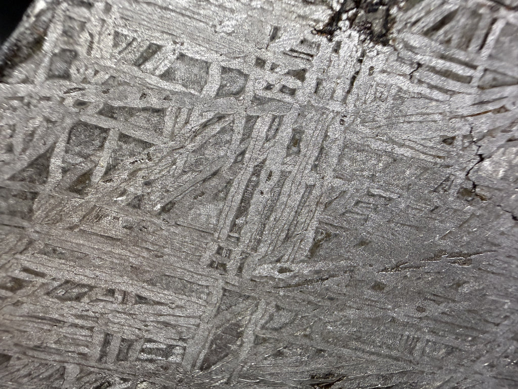 Close view of the interlocking Widmanstatten pattern in the 186.60g Aletai IIIE-an iron meteorite slice