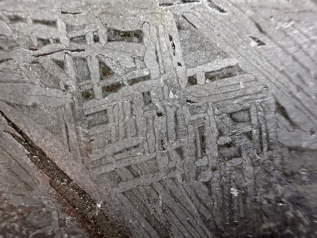 Close view of the interlocking Widmanstatten pattern in the 268.47g Aletai IIIE-an iron meteorite slice