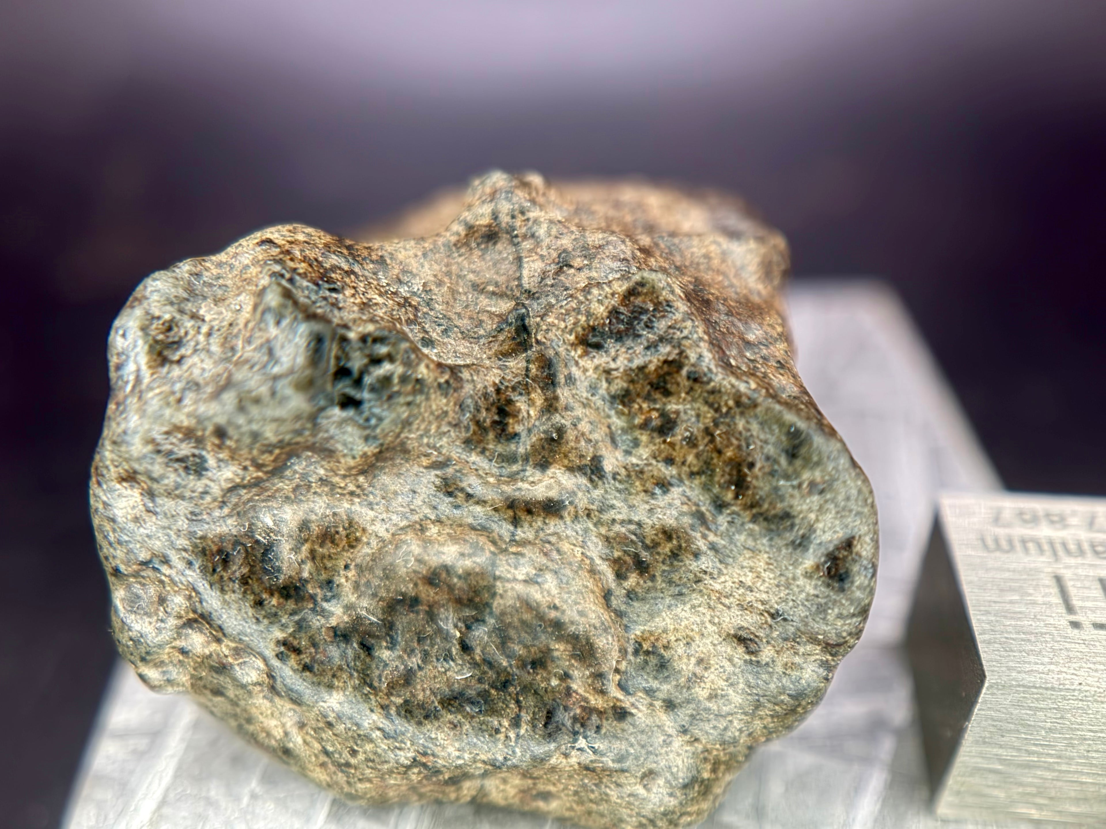 Amgala 001 Martian shergottite, close detail of remnant fusion crust on 40.80g complete individual