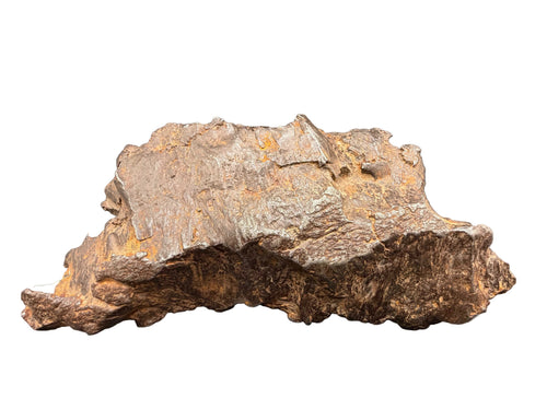 Gebel Kamil 1414g iron meteorite, front face showing shear lines and lizard skin texture