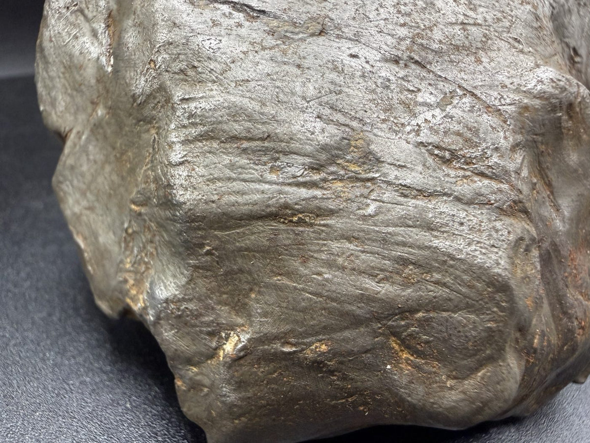 Close-up of sweeping shear lines on Gebel Kamil iron meteorite