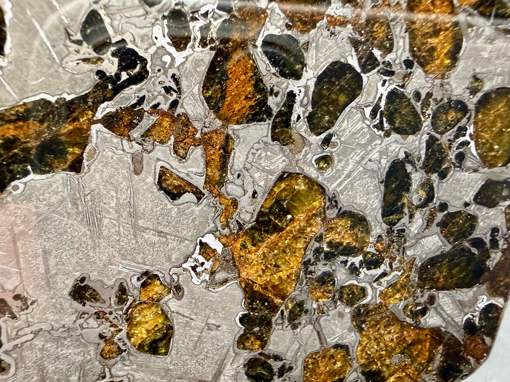 Macro view, Gyarub Zangbo Pallasite, fractured olivine crystals revealing internal texture in iron-nickel matrix, 86.11g