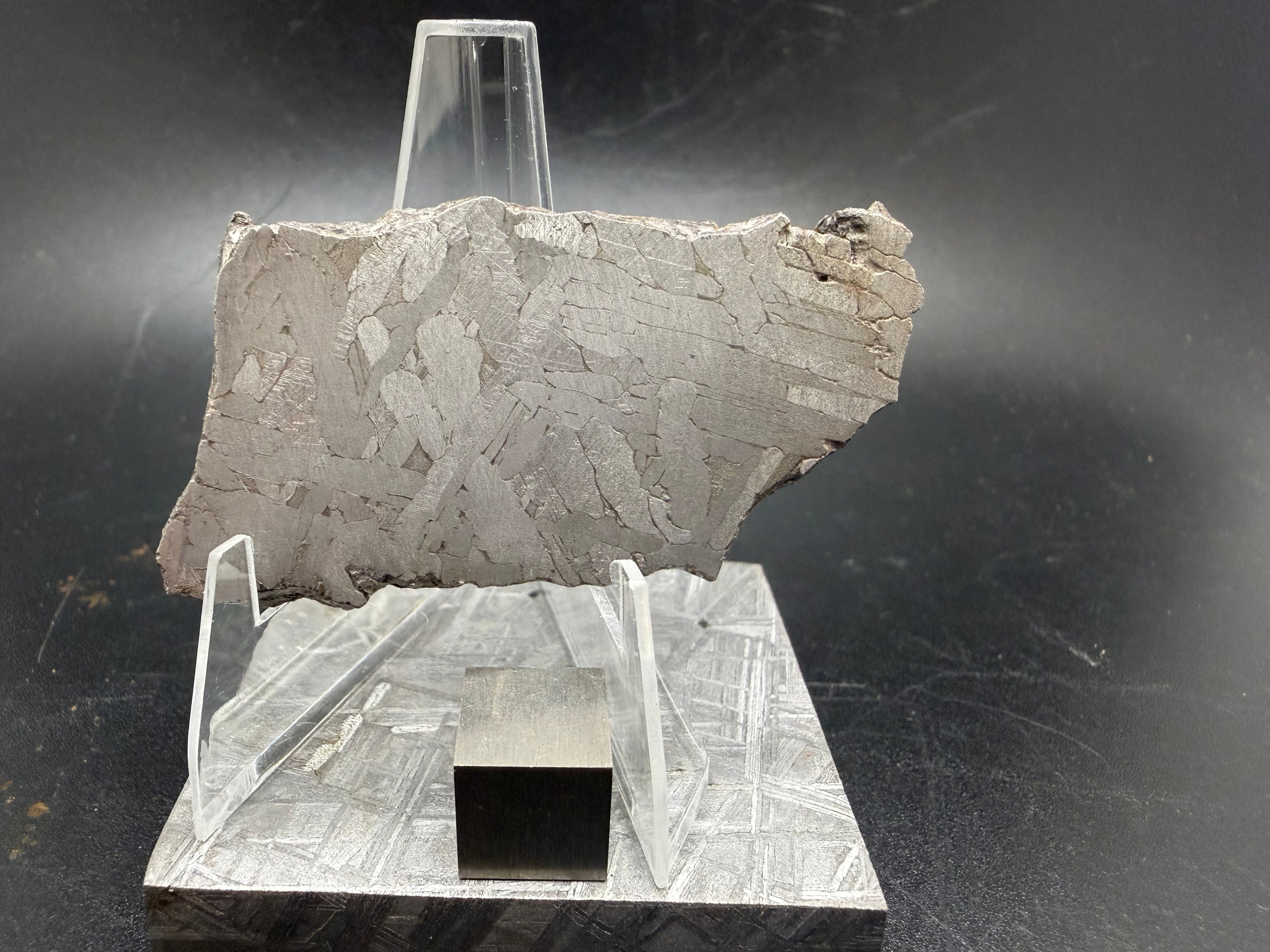 Kaalijärv iron meteorite slice on display, angled view of back side