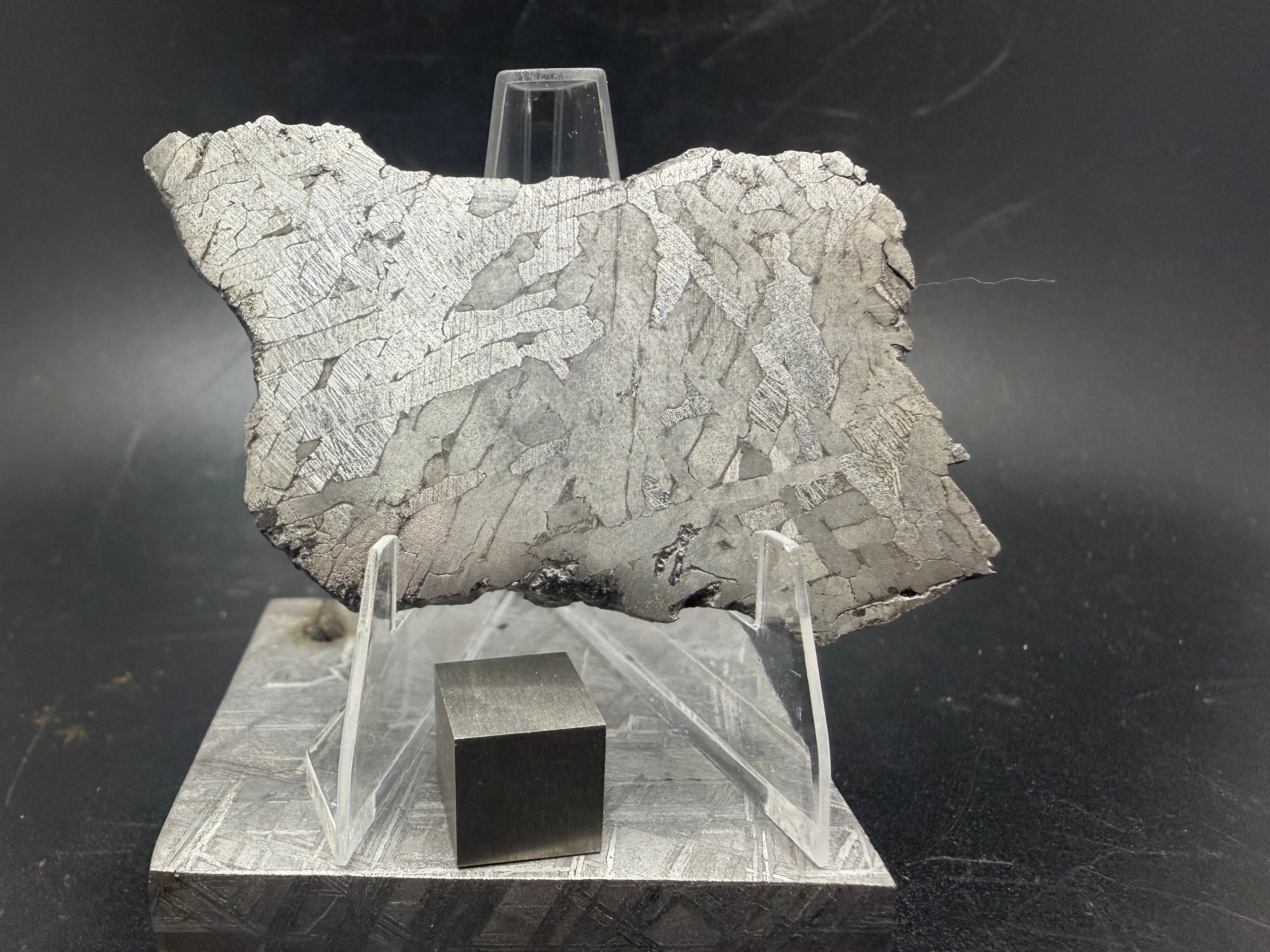 meteorite-slice-33-38g-display.jpgKaalijärv IAB-MG iron meteorite slice 33.38g on acrylic display stand, full specimen view