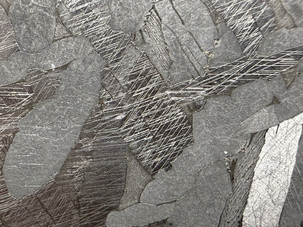 Kaalijärv iron meteorite 38.39g -- etched surface showing intersecting kamacite lamellae and Widmanstätten structure