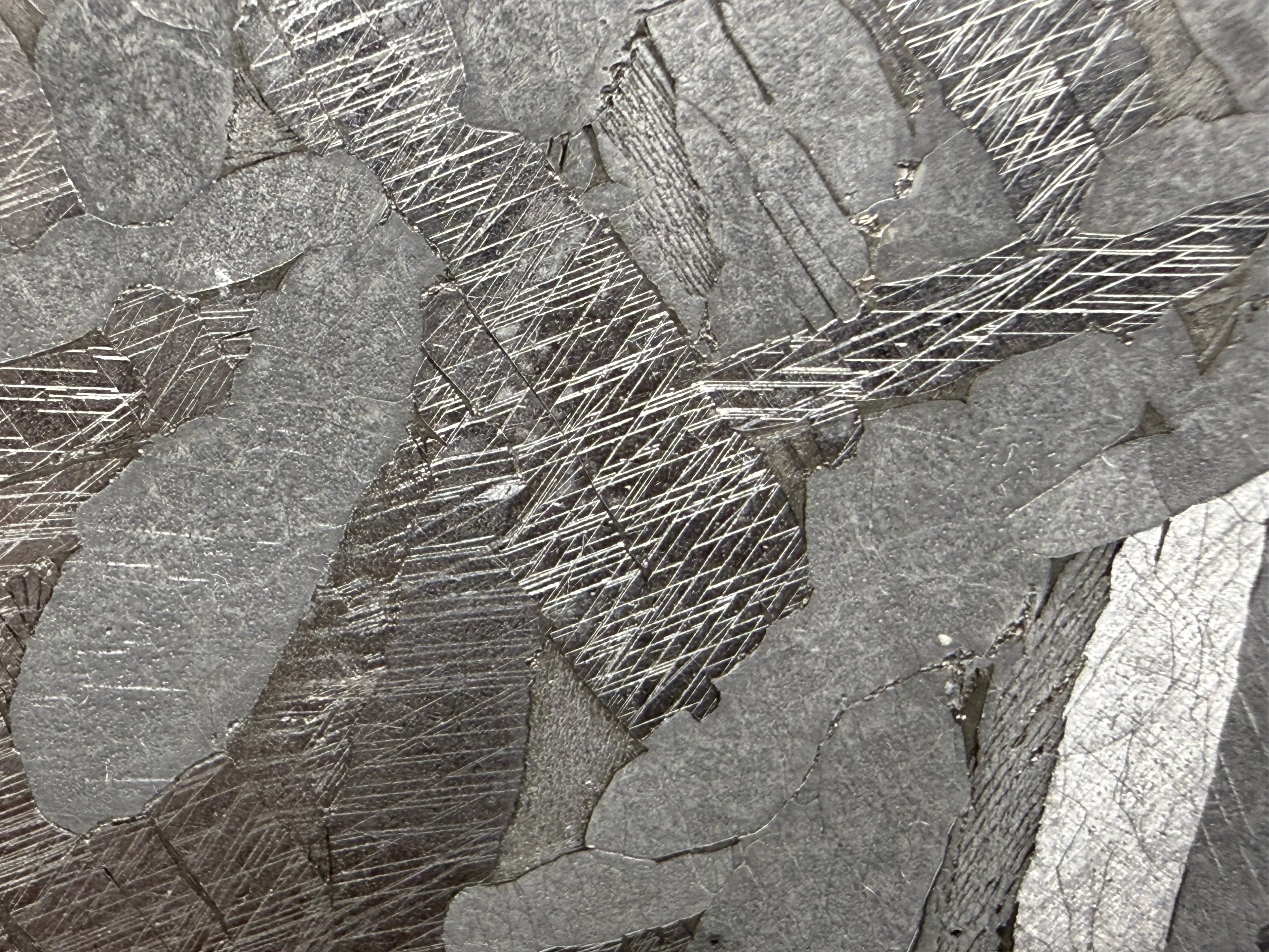 Kaalijärv iron meteorite 38.39g -- etched surface showing intersecting kamacite lamellae and Widmanstätten structure