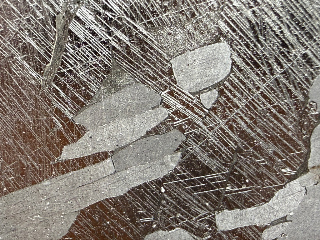 Kaalijärv iron meteorite 27.00g -- Neumann bands intersecting kamacite lamellae in Widmanstätten pattern