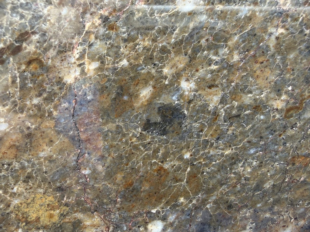 Laayoune 002 lunar feldspathic breccia, macro detail of angular clasts set in a pale vein network