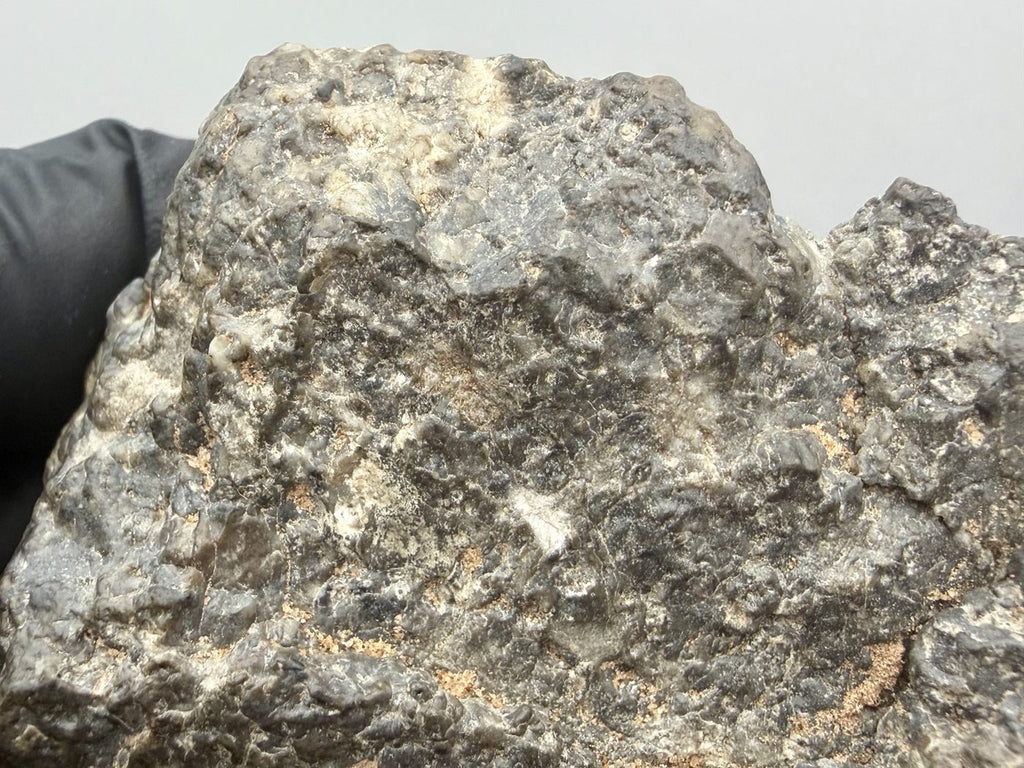 Close detail of the natural surface texture of the Laayoune 002 lunar breccia