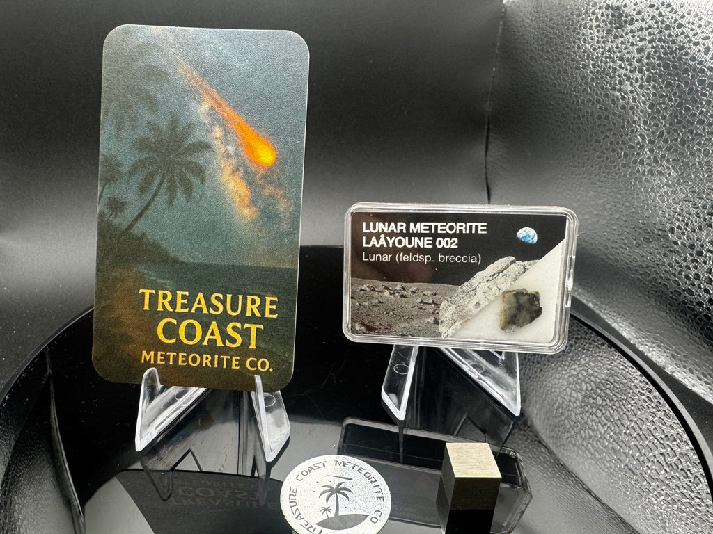 Laâyoune 002 lunar meteorite slice in small display box with specimen label