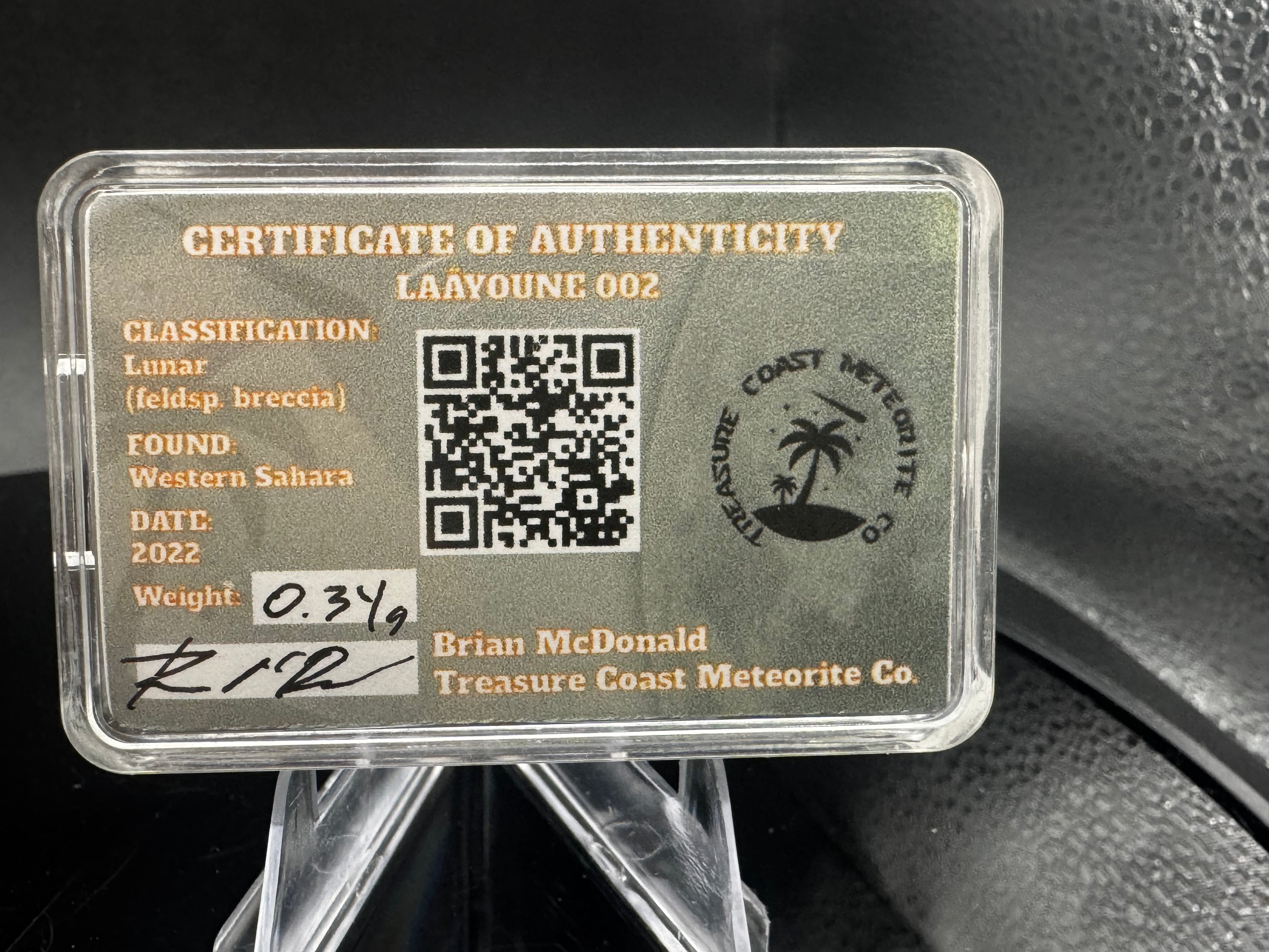 Laâyoune 002 lunar meteorite display box with specimen card and QR code