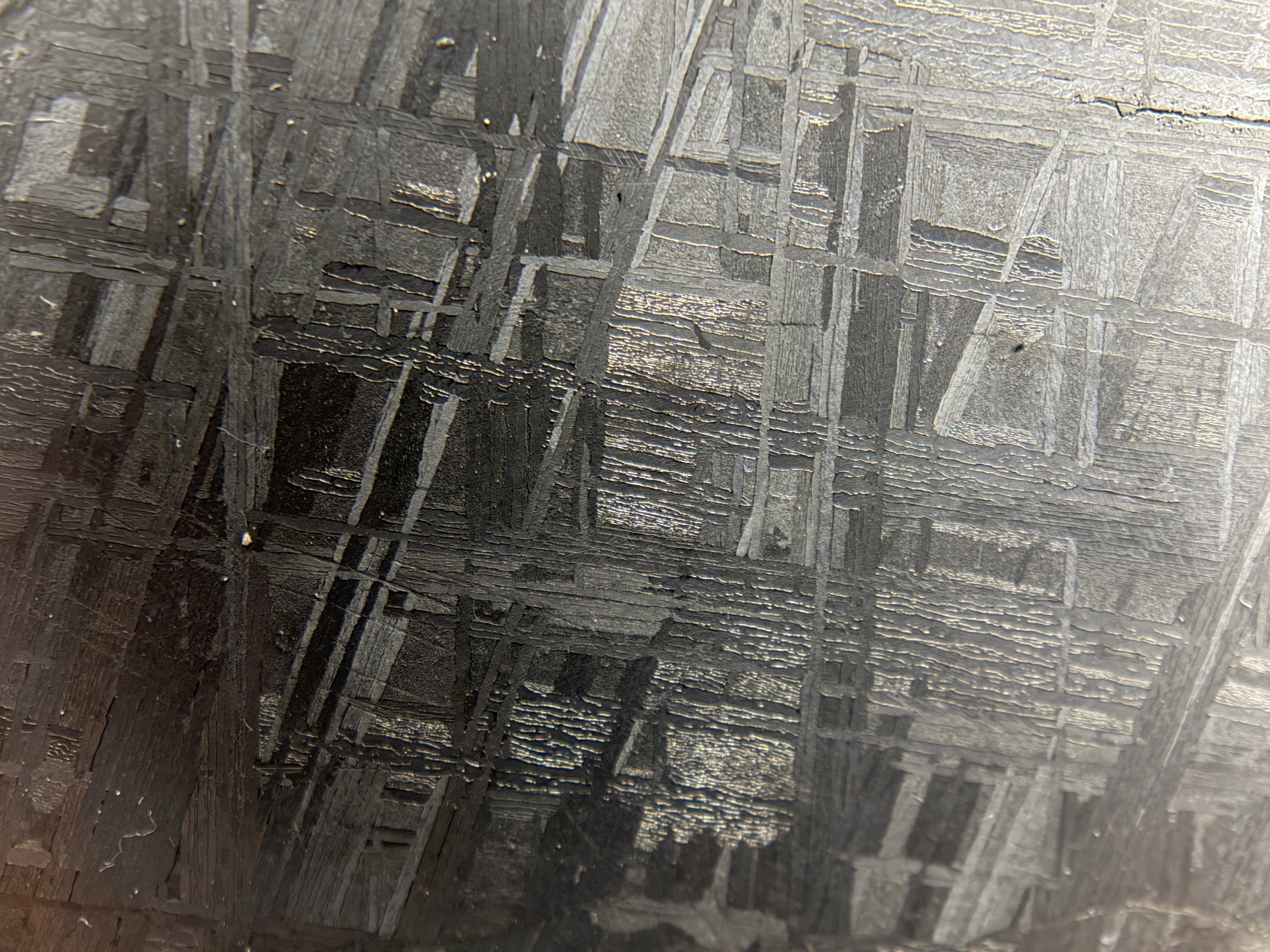 Muonionalusta iron meteorite 330.81g -- continuous Widmanstätten pattern across polished and etched face