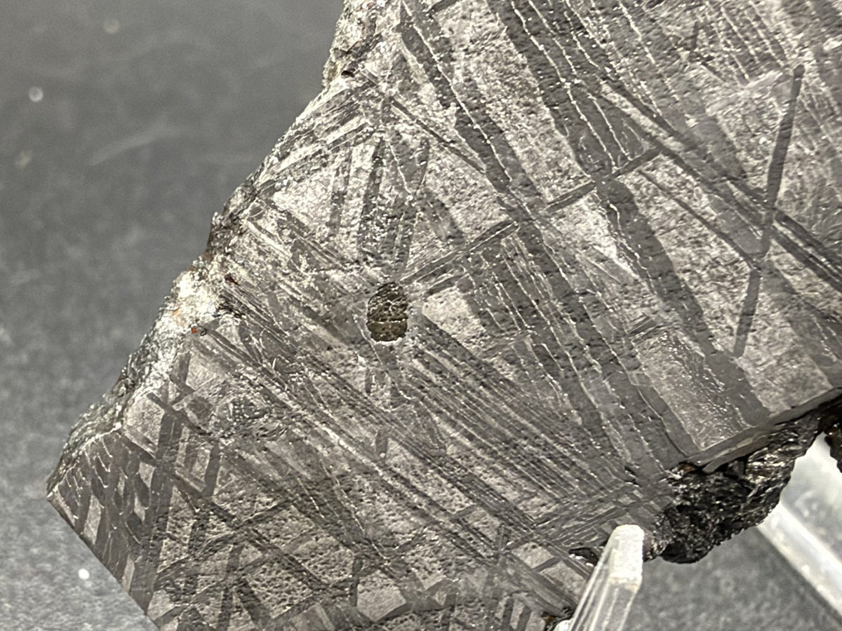 Etched, unpolished reverse face of the 33.46g Muonionalusta slice