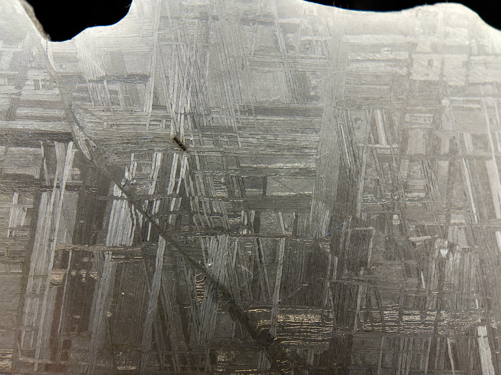 Display view of large Muonionalusta iron meteorite slice showing kamacite and taenite Widmanstätten structure, 292.00g