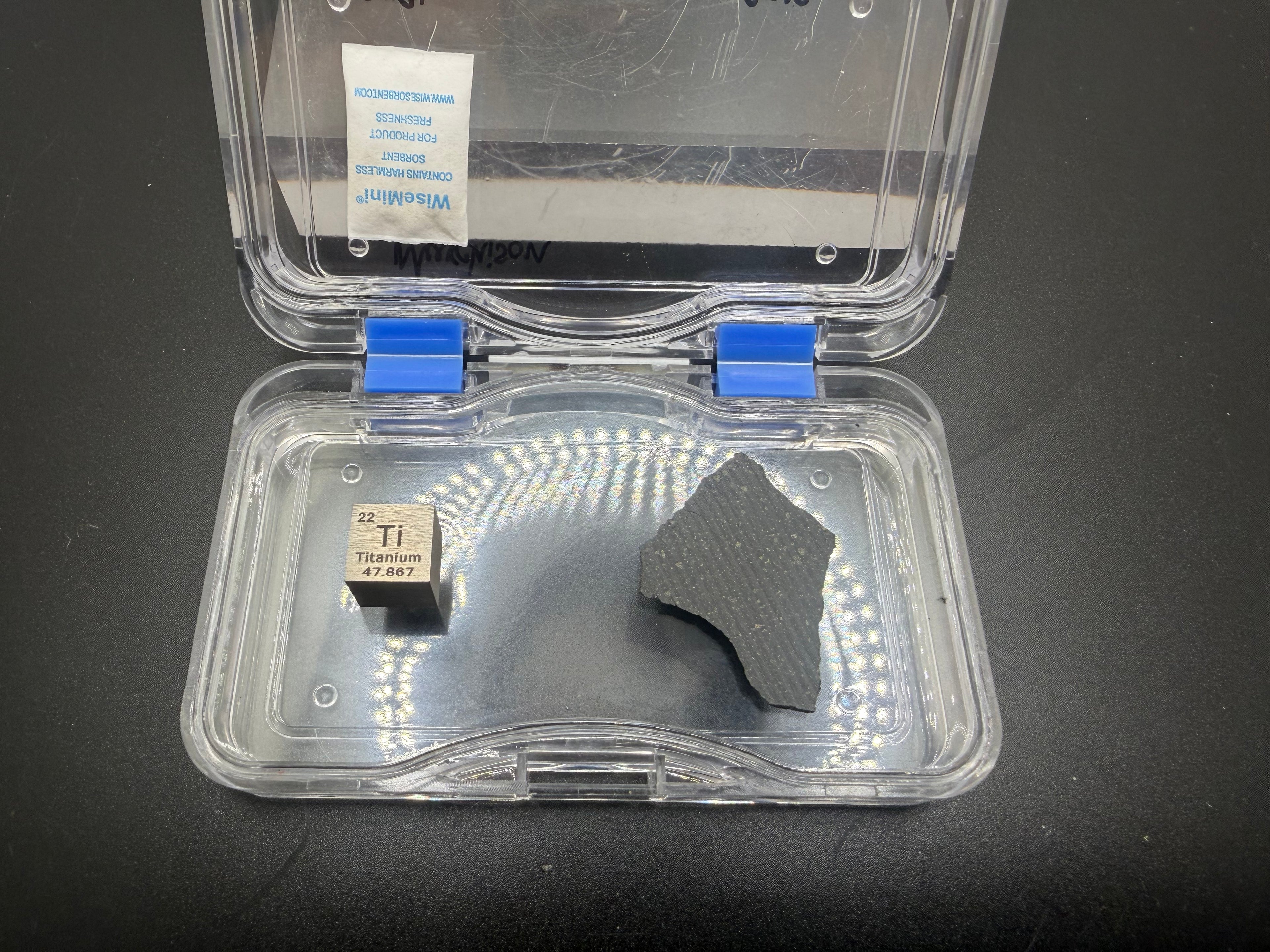 Murchison CM2 carbonaceous chondrite meteorite full slice weighing 2.184 grams