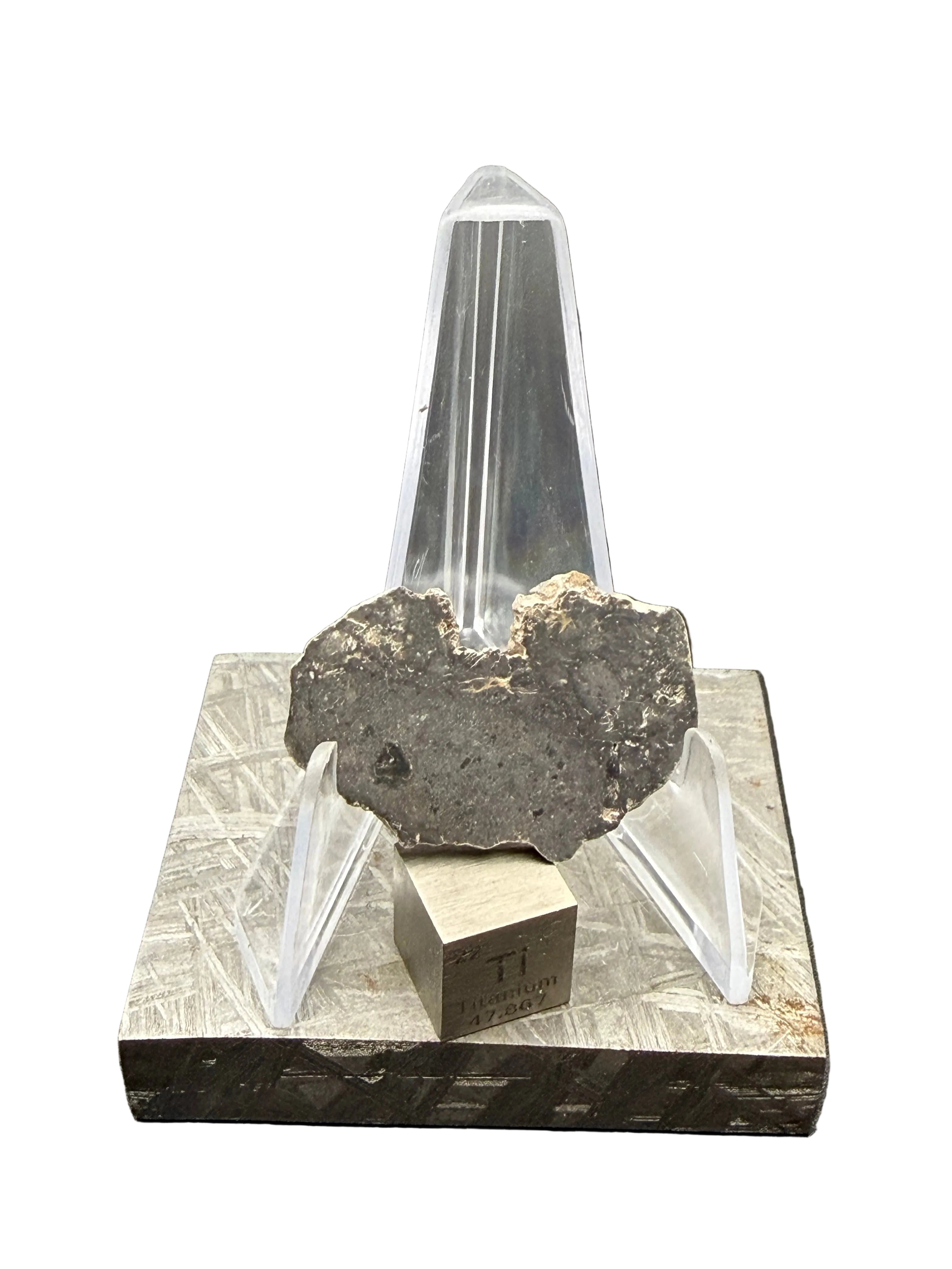 NWA 17706 lunar meteorite 1.91g full slice on acrylic display stand with titanium cube for scale