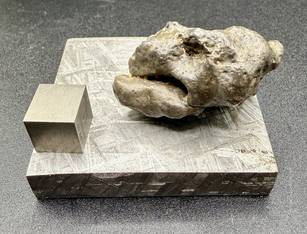 NWA 17706 lunar meteorite, 19.15 g individual seen end on, rounded knobby form