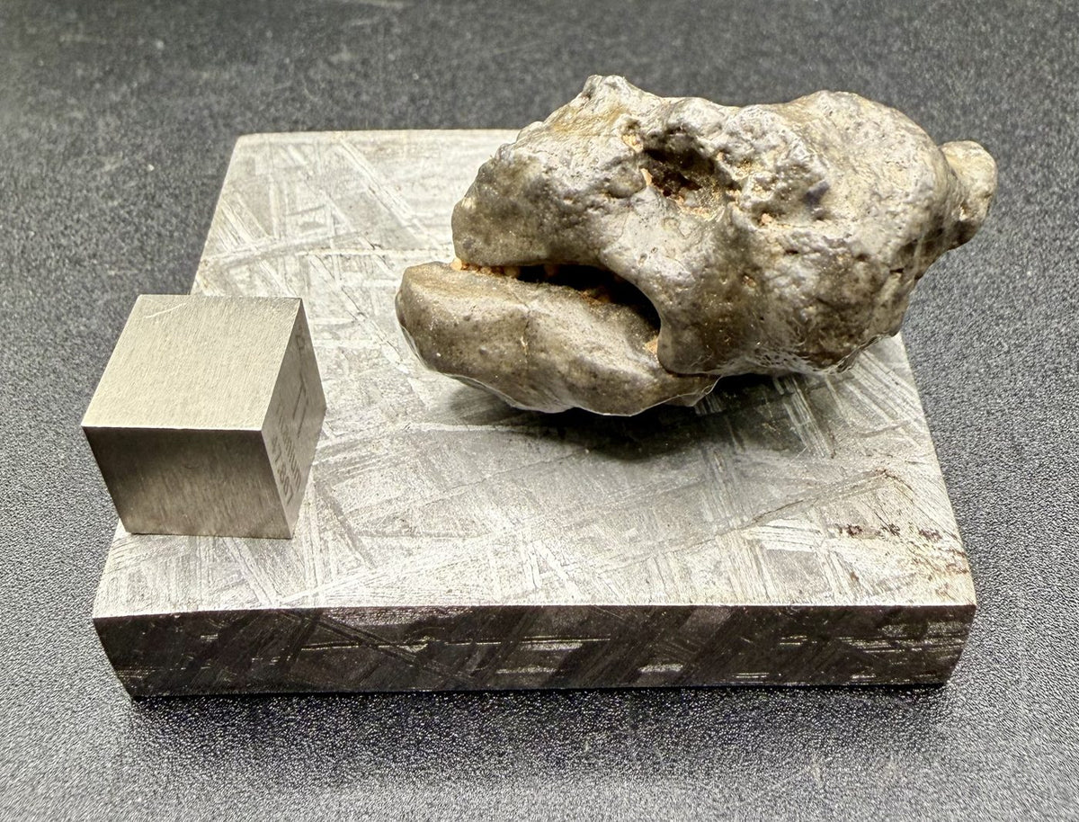 NWA 17706 lunar meteorite, 19.15 g individual seen end on, rounded knobby form