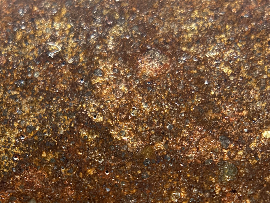 Macro view of NWA 17916 CO3 carbonaceous chondrite meteorite showing closely spaced rounded chondrules on the polished face, 11.28g